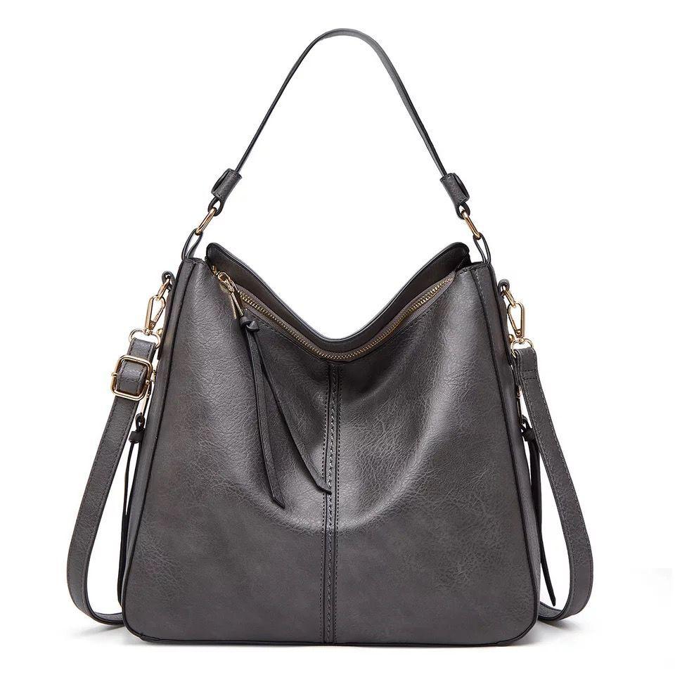 Ersilia™ - Elegant leather bag with large capacity and side pockets